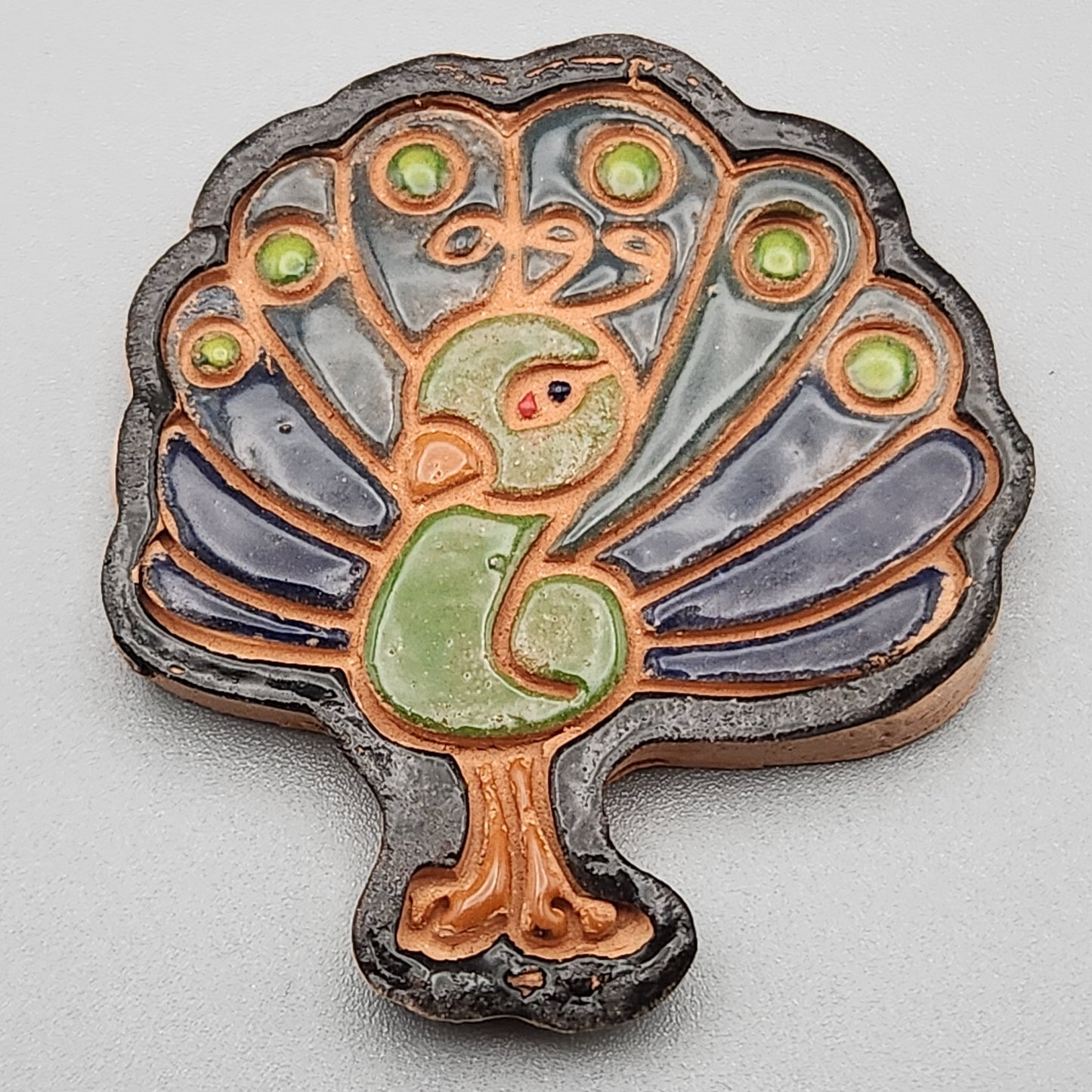 Peacock magnet